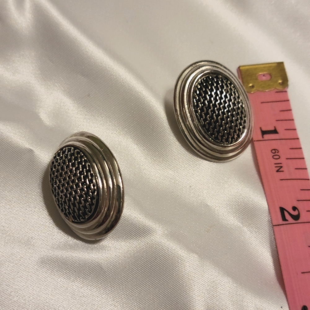 Avon magnetic two in one earrings.